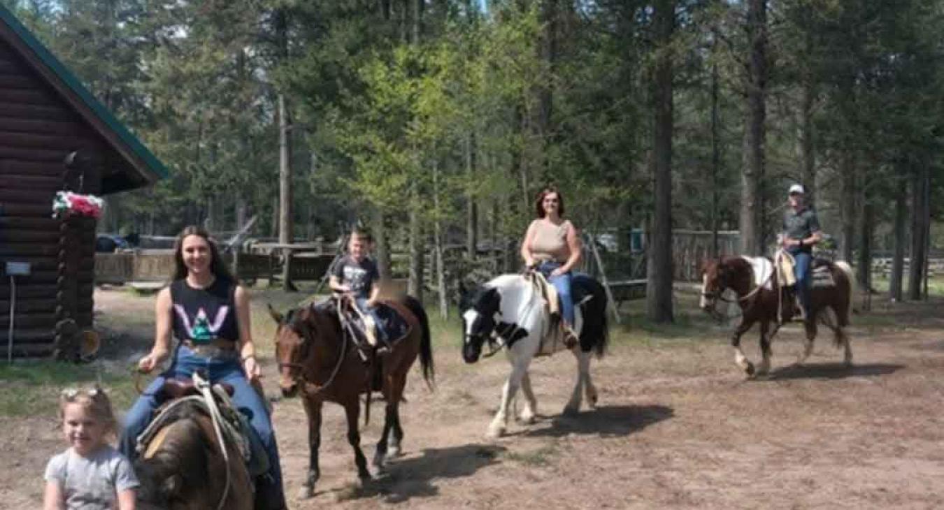 Family horseback riding at Haviland's Old West Adventures near Harriman State Park Island Park Idaho
