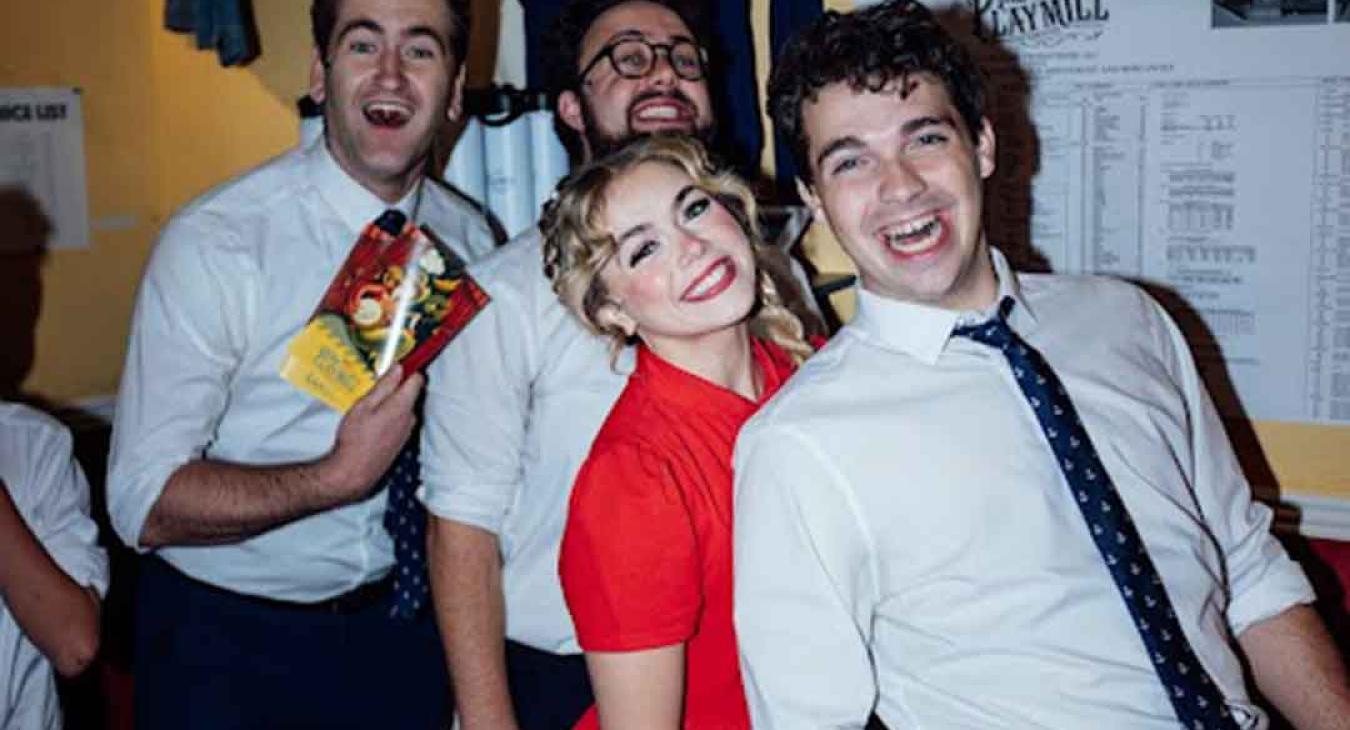 Playmill Theatre cast members laughing backstage before a performance at Island Park Idaho